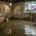 Emergency Sewer Backup Repair - water with flooded basement and repair van in the background - 02