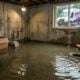 Emergency Sewer Backup Repair - water with flooded basement and repair van in the background - 02
